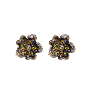 Vintage gold flower earrings with colorful rhinestones in a retro jewelry design