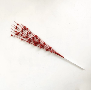 Detail of red glittered artificial berry pick with foam balls for Christmas decoration