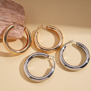 Minimalist thick hoop earrings in gold and silver finish with high-gloss plating