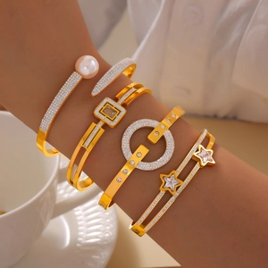 Four-piece gold bracelet set for women featuring hollow geometric designs and zircon pearls