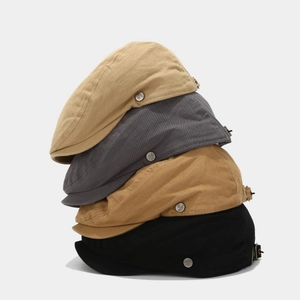 Set of four retro cotton newsboy hats in beige, grey, khaki and black colors