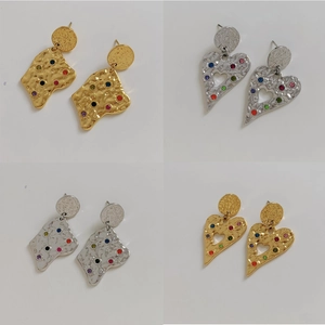 Golden and silver stainless steel earrings with heart shapes and colorful rhinestones