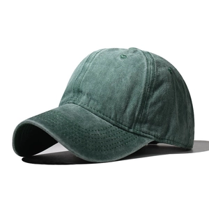 Retro washed dark green baseball cap in twill cotton with minimalist six-panel design