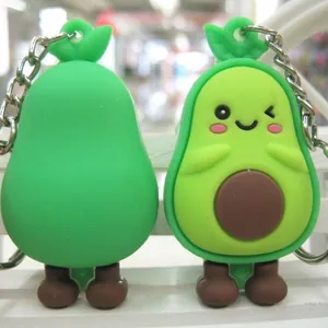 Cartoon avocado keychain with a cute winking smiley face on a white background