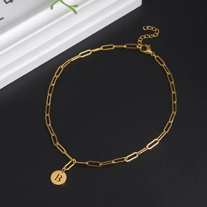 Gold paperclip chain necklace with a round letter B pendant and adjustable clasp