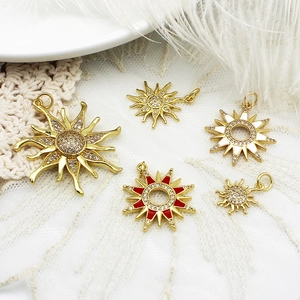 Gold starburst pendants with micro-pave crystals and red enamel for DIY jewelry