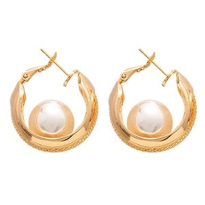 Golden mesh hoop earrings with large white pearl inserts in a modern geometric style
