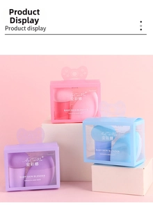 Close-up of soft mushroom-head makeup sponges in colorful pink and purple tones