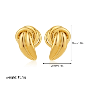 Detail view of gold knot earrings showing 27mm height and 20mm width dimensions