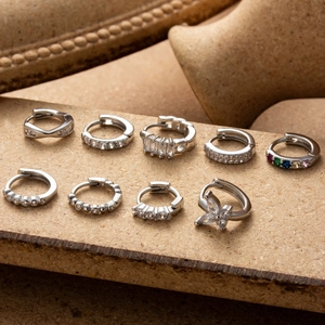 Silver copper earring set with cubic zirconia featuring round, square and butterfly designs