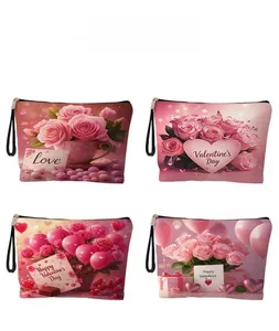 Detail view of four Valentine's Day makeup bags with rose and heart prints and zippers
