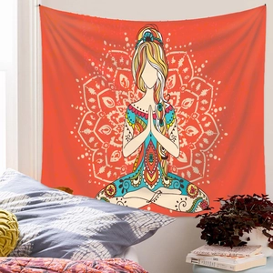 Detailed view of bohemian mandala tapestry featuring a meditating woman in coral orange