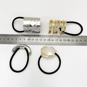 Minimalist alloy hair ties set featuring gold and silver metallic geometric accents
