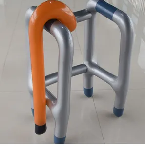 Detail view of inflatable walking stick and walker frame set for novelty party props