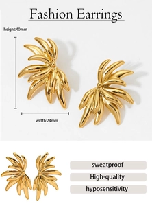 Detail view of gold flower earrings with 40mm height and sweatproof features