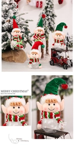 Detailed view of Christmas elf candy jars with sequins and festive forest decorations