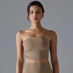 Close-up of ruched side details on seamless breathable tube top sports bra