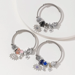 Three stainless steel beaded bracelets with evil eye pendants and FOR KEEPS heart charms