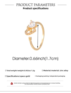 Detailed view of adjustable golden heart ring with sparkling cubic zirconia stone