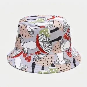Close-up of light grey bucket hat with colorful mushroom print patterns and cotton texture