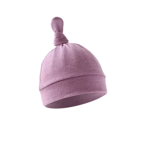 Detail of soft light purple newborn knotted beanie showing texture and fabric quality