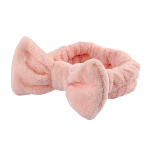 Plush pink headband with a large bow for washing face, soft aesthetic hair accessory