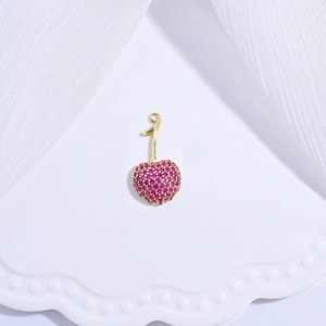 Elegant cherry pendant with red cubic zirconia pavé set in gold plating for jewelry