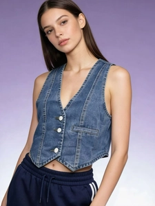 Women casual denim vest in blue with V-neck button closure and asymmetrical hem design