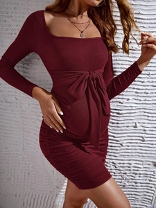 Burgundy long sleeve maternity dress with square neck and textured knit fabric