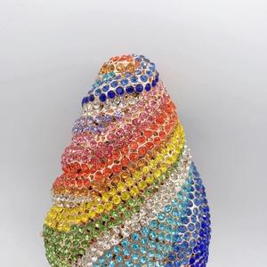 Colorful rhinestone encrusted sea shell clutch bag with crystal pavé and metal frame