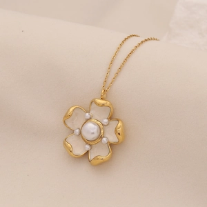Golden necklace with white enamel 3D flower pendant and delicate pearl accents