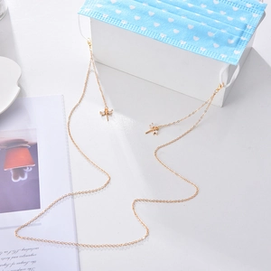 Golden mask chain featuring rhinestone dragonfly charms and lobster clasps for glasses