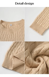 Detailed views of cable knit sweater collar, ribbed cuffs and textured beige fabric finish