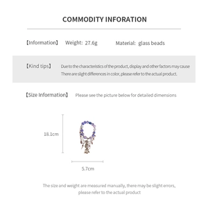 Detailed view of handmade glass beads charm with dimensions 18.1cm and 27.6g weight