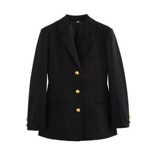 Detail of black plaid blazer featuring gold metal buttons and premium textured fabric