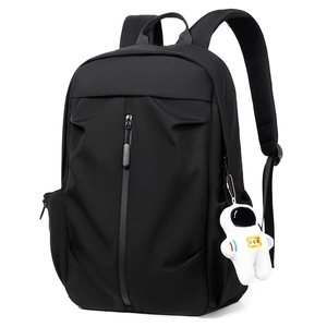 Minimalist black water-resistant casual backpack with a cute astronaut plush charm