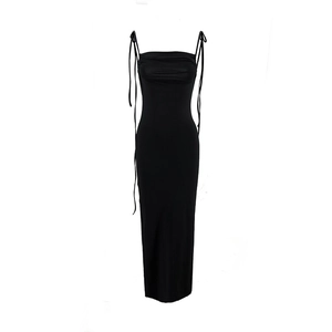 Detail of the elegant black bodycon dress featuring slim shoulder ties and a smooth finish