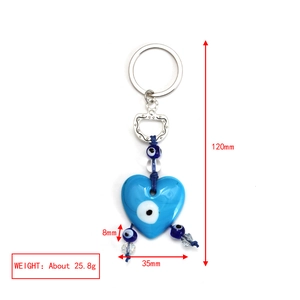 Detailed view of evil eye heart keychain with 120mm length and silver metal ring