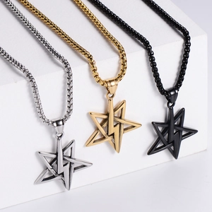 Three-color stainless steel pentagram and lightning pendants on minimalist display