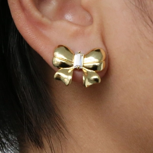 Gold plated bow stud earrings for women with a rectangular zircon stone inlay