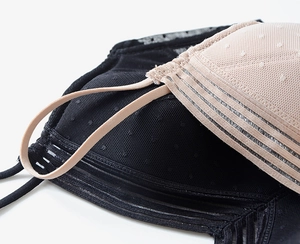 Close-up of breathable mesh cup lining and seamless edge on this backless bra
