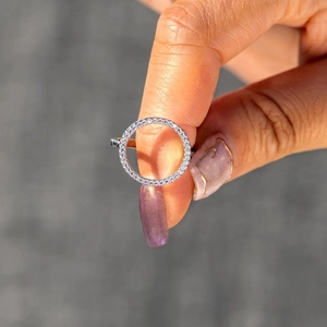 Macro view of S925 sterling silver ring with micro-paved cubic zirconia circle