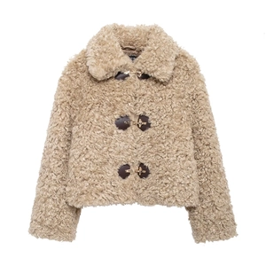 Women's beige faux shearling jacket with stylish brown leather metal buckle closures