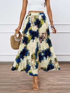 Close-up detail of high-waist pleated maxi skirt with blue and yellow oil painting print