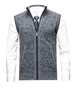 Close-up of grey knitted zipper vest with stand collar texture and marled yarn detail