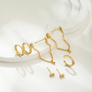 Elegant 18K gold plated earring set with sparkling zircon studs and ear cuffs