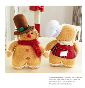 Close-up of gingerbread gnome plush with red scarf and textured fabric for Xmas decor