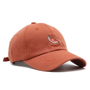 Close-up of high-quality cotton baseball cap with detailed watermelon slice embroidery