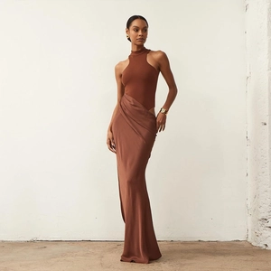 Elegant brown backless satin maxi dress with halter neck design and slim fit silhouette