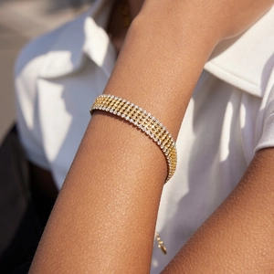 Lussuoso bracciale tennis a quattro file in oro e argento con zirconi cubici pavé